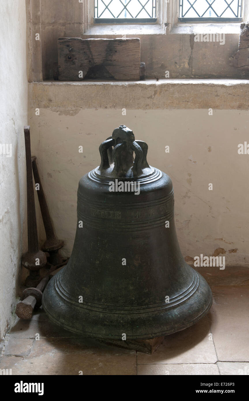 Old bell in St. Leonard`s Church, Bledington, Gloucestershire, England, UK Stock Photo